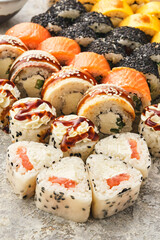 Japanese sushi food. Maki ands rolls with tuna, salmon, shrimp, crab and avocado. Assorted sushi