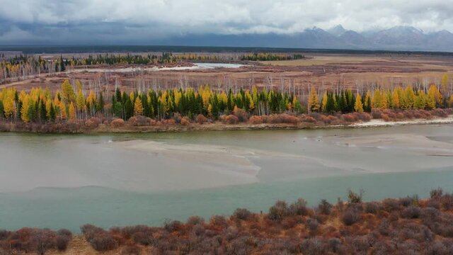 Eastern Sayans in autumn. Tunka valley before the rain. Irkut River.