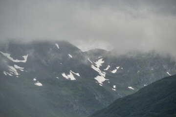 Scenic view of clouds over the mountains in Norway