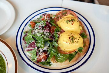 Egg benedict in Italian restaurant