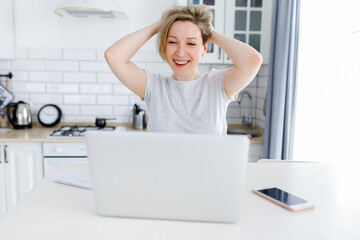 Fototapeta na wymiar happy woman working on laptop