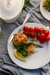 Fish patties fishing near the river. Daylight