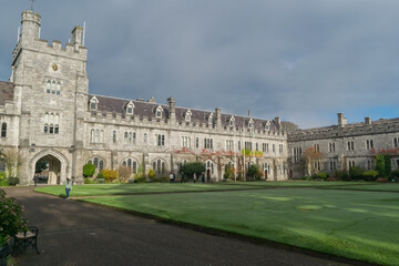 CORK CITY, IRELAND - NOVEMBER 22, 2020: View of the "Long Hall" and the clock tower of the University College Cork quadrangle.