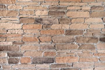 Brick wall made of old burnt bricks