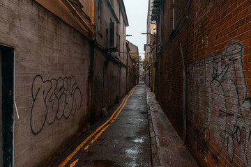 Fototapeta na wymiar CORK CITY, IRELAND - NOVEMBER 8, 2020: alleyway in the historic city of Cork in the Republic of Ireland.