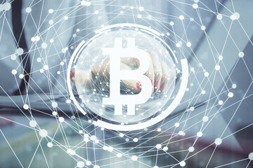 Double exposure of woman hands typing on computer and crypto market theme hologram drawing. Blockchain concept.