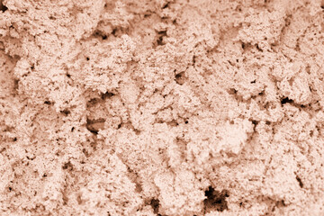 Close up on sand texture. Sandy stucco background. Really detailed stucco for bathroom and mosaics. Lime mixed with resin. Porous and calcareous rock backdrop.