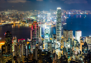 Fototapeta na wymiar Panoramic night view of Hong Kong from the Victoria peak in Hong Kong.