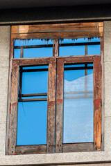 old wooden window in a wall