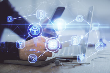 Double exposure of man's hands holding and using a phone and social network theme drawing.