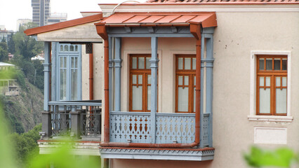 Fototapeta na wymiar Houses with a vintage wooden balcony in Georgia