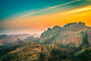 Fototapeta na wymiar Beautiful sunset sky over the unique canyon like Belogradchik rocks in Bulgaria 