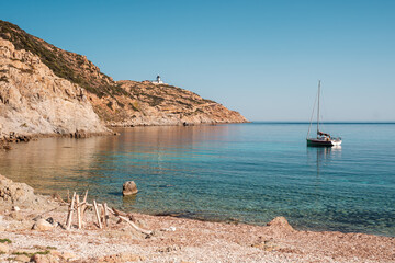 Fototapeta na wymiar Sailing yacht moored in bay in Corsica