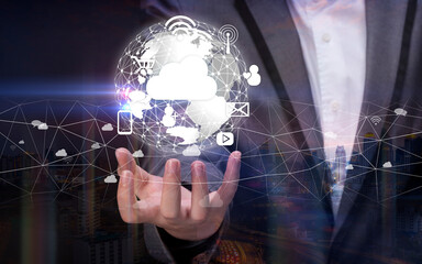 Hand holding a digital world with Smart services icons and internet of things, wireless networks, Information communication technology concept.