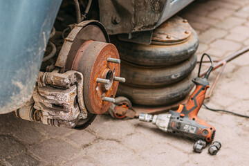 Fototapeta premium Disc brake, drum brake, removing wheel