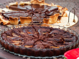 Delicious homemade cakes. Pies with chocolate and berries.