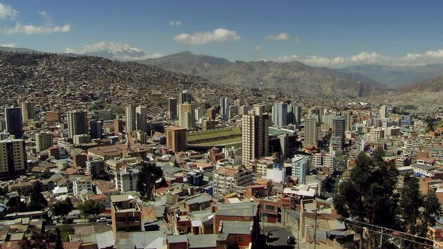 View over Skyscrapers and Flats in the City La Paz and the Sports Stadium Hernando Siles, La Paz, Bolivia, South America. 4K Resolution.
