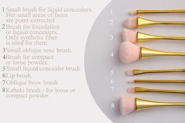 Set of makeup brushes on grey background