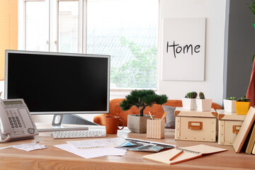 Comfortable workplace of fashion designer with modern computer in office