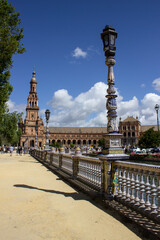 Fototapeta na wymiar The Plaza de España or Spain Square, is a plaza in Parque de María Luisa, in Seville, Spain. It was built in a Moorish paradisiacal style for the Ibero-American Exposition of 1929.