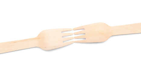 Wooden forks on white background