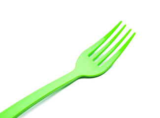 Plastic fork on white background