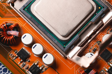 close-up of a printed circuit board with microchips and radio parts with a processor. Background...