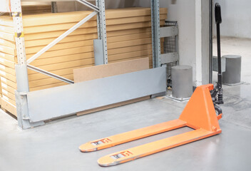 The Industrial handlift equipment for lift the cardboard box on to the rack in the store warehouse.
