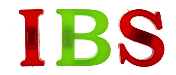 The word ibs is lined with multicolored plastic letters isolated on white background.