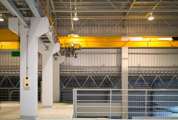 Overhead crane inside factory or warehouse. That industrial machinery or lifting equipment consist...