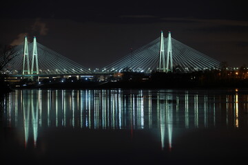 Big cable-stayed bridge of St. Petersburg illuminated at night
