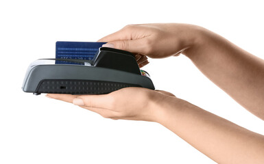 Female hands with credit card and payment terminal on white background