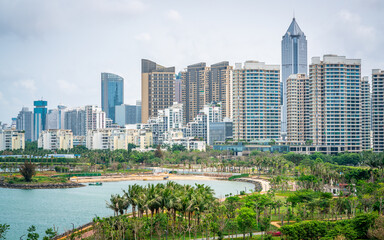 Obraz premium Haikou city skyline with sea and shoreline on overcast weather day Haikou Hainan China
