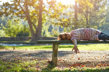 Child girl enjoying outdoors nature in the park.