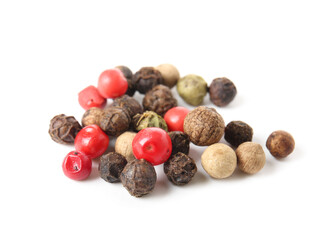 Mixed peppercorns on white background