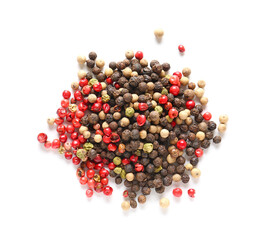 Mixed peppercorns on white background