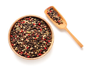 Bowl and scoop with mixed peppercorns on white background