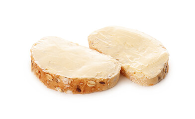 Slices of fresh bread with butter on white background