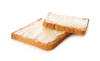 Slices of bread with butter on white background