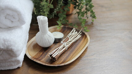 Spa accessories,Beautiful composition of spa , spa relax concept,  herbs for massage, beautiful sap set on wood table,For marketing products