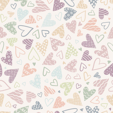 Lovely hand drawn doodle hearts seamless pattern, pastel colored hand drawn background, great for Valentine's or Mother's Day, textiles, banners, wrapping, wallpapers - vector design