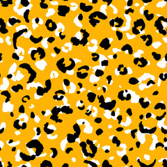 Abstract modern leopard seamless pattern. Animals trendy background. Orange and black decorative vector stock illustration for print, card, postcard, fabric, textile. Modern ornament of stylized skin