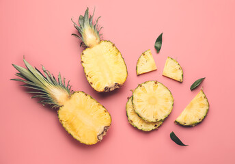 Cut fresh pineapple on color background