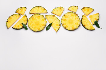 Slices of fresh pineapple on white background