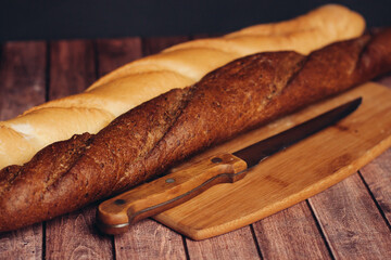 sliced fresh loaf on a wooden cutting board kitchen meal