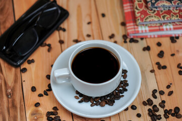 cup of coffee with beans