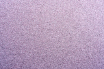 Colored paper with strong structure as a background, photographed in the studio