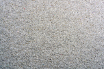 Colored paper with strong structure as a background, photographed in the studio