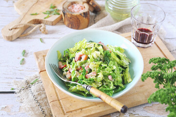  Fried savoy cabbage with pork fatback, olive oil and glass of red vine