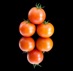 Three tomatos put together with their reflection on a black background, a wallpaper with fresh and natural tomatos